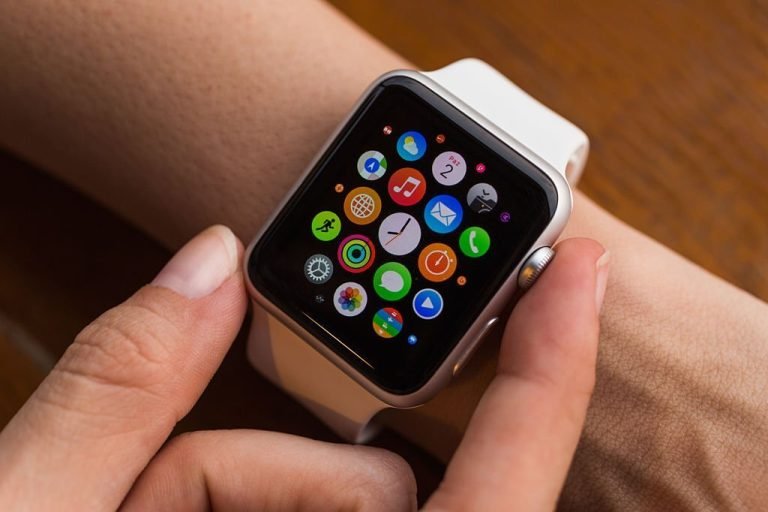 Istanbul, Turkey - August 2, 2015: Istanbul, Turkey - August 2, 2015: A woman wearing 42mm stainless steel Apple Watch with white sports band. The Apple Watch became available April 24, 2015, bringing a new way to receive information at a glance, using apps designed specifically for the wrist.