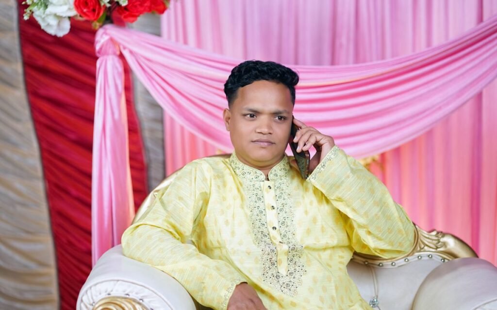 scam call warning: Indian man listening doubtfully on a phone call