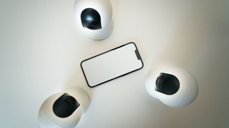 smartphone surrounded by security cameras, showing how apps watch your phone