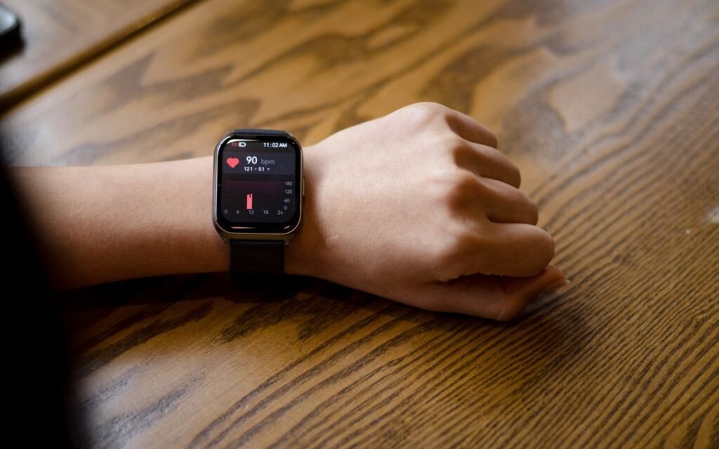 smartwatch health features: heart rate of 90 bpm on a watch
