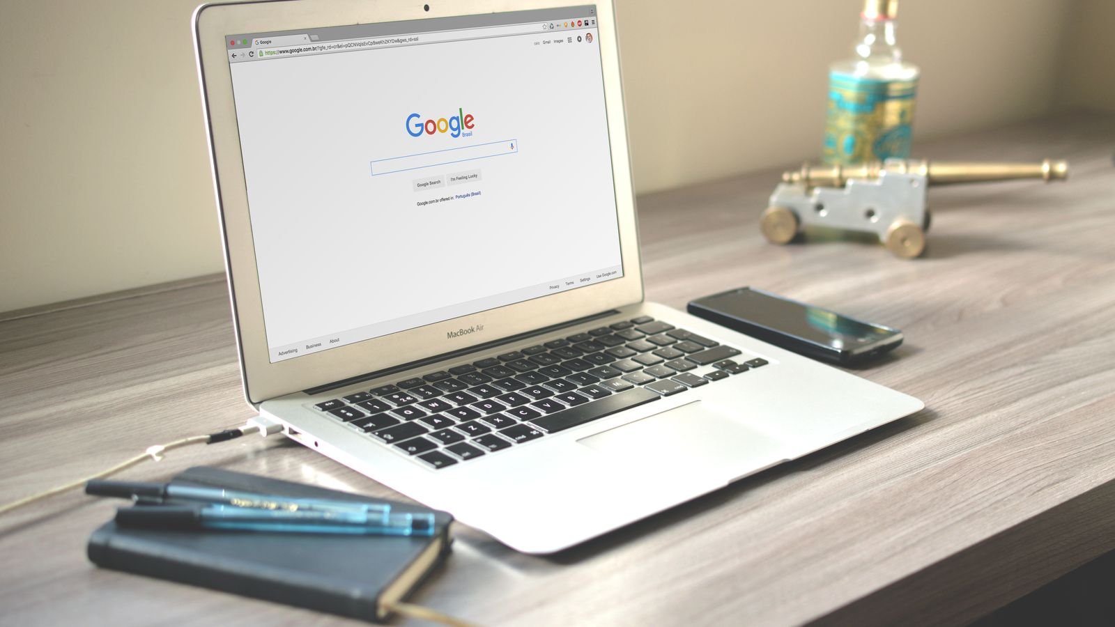 update chrome: laptop showing a Google search page on a desk