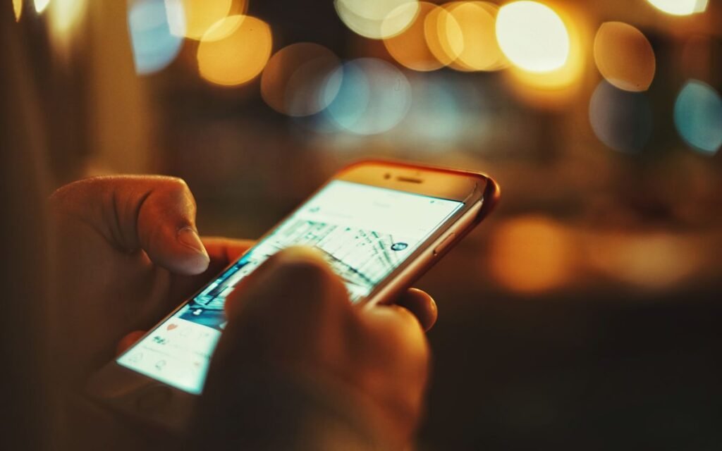 a person using a smartphone at night
